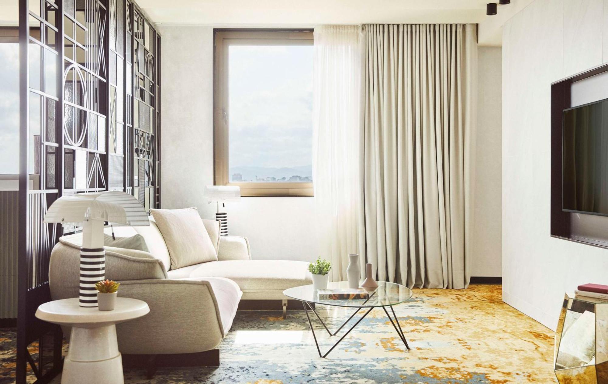 ホテル ソフィア バルセロナ イン ザ アンバウンド コレクション バイ ハイアット エクステリア 写真 A living room with a carpet